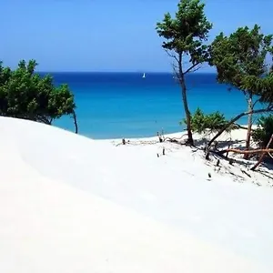Villa Piscinas Италия